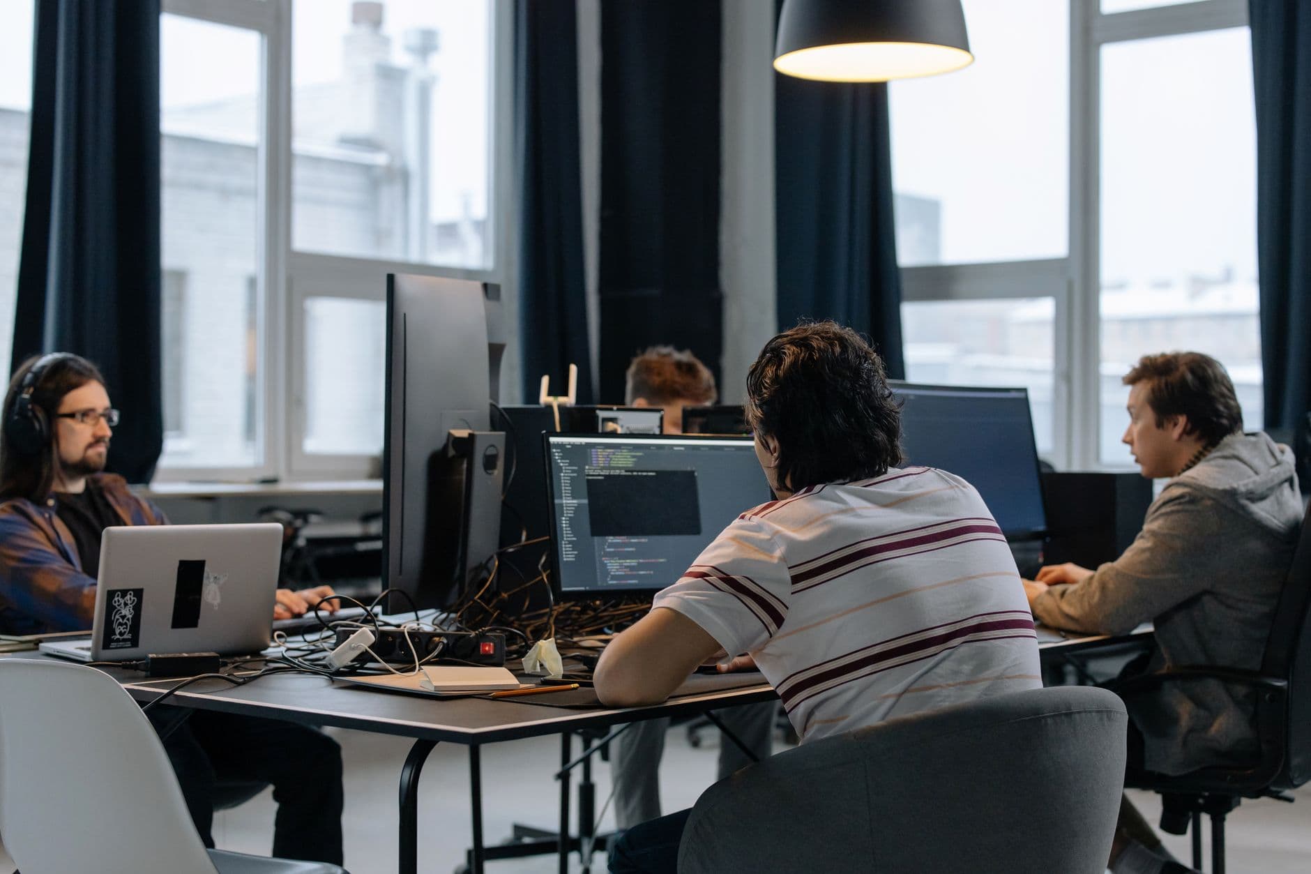 Startup team collaborating in a shared workspace