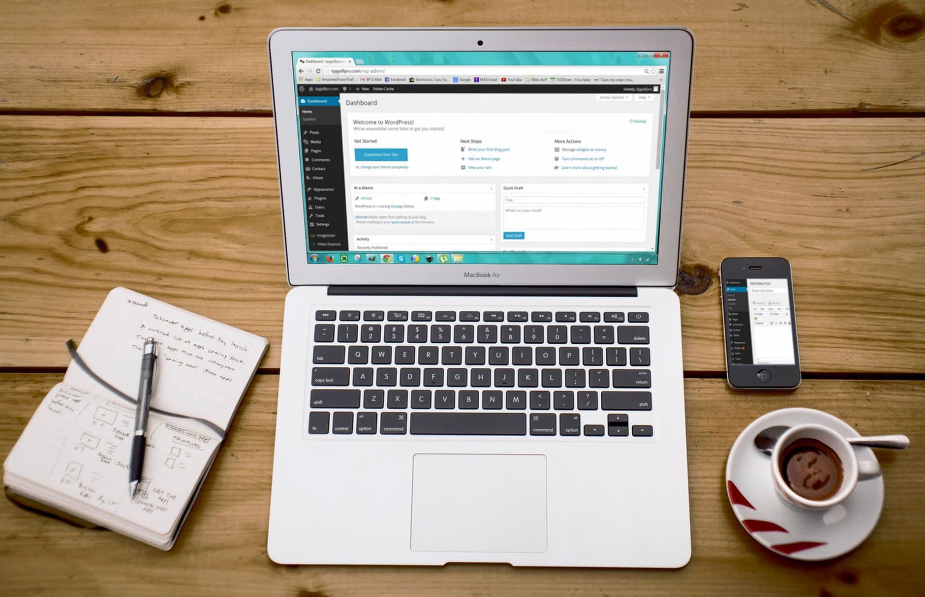 Laptop showing a WordPress site being designed